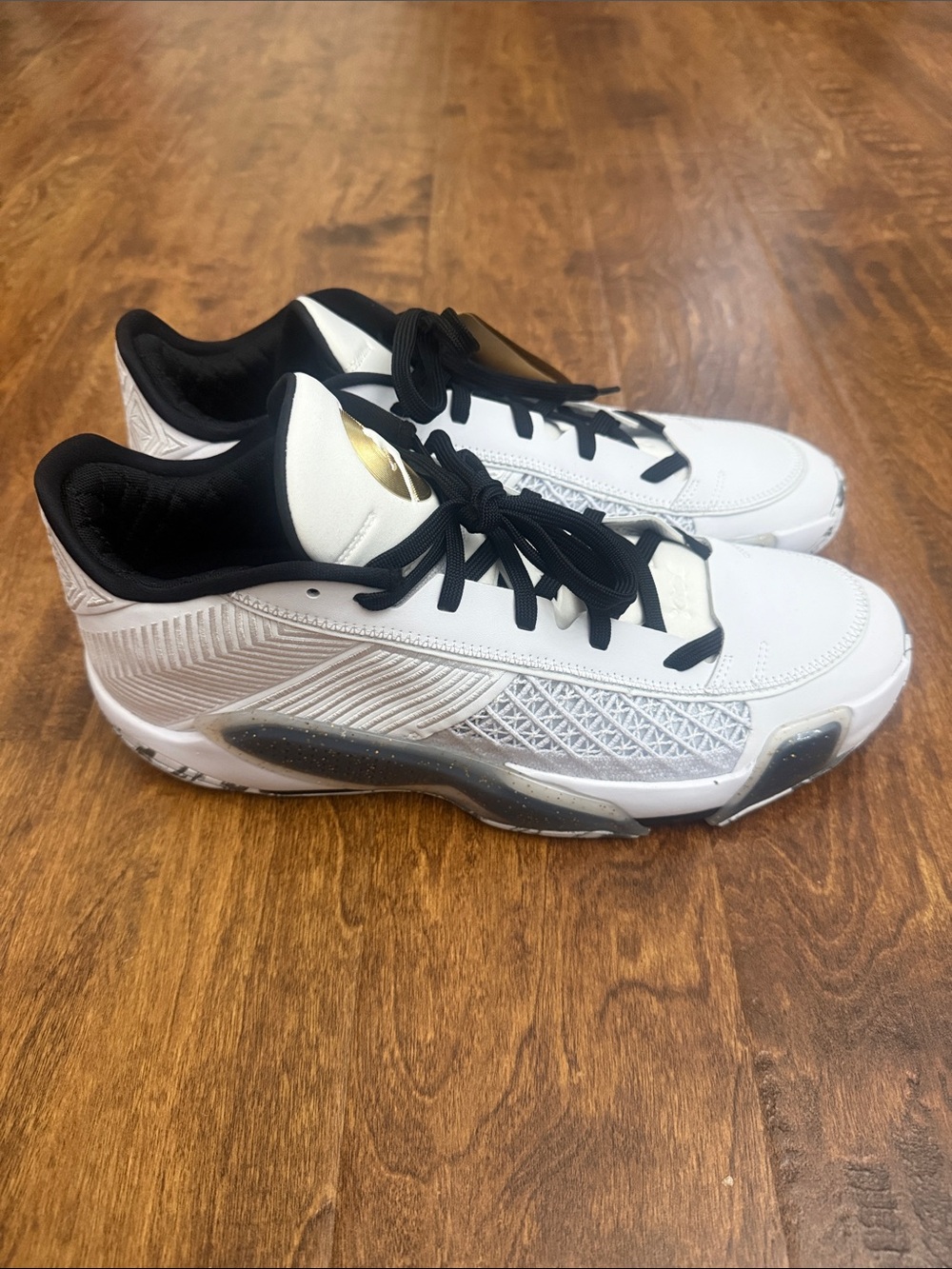 Jordan Men's White and Black Athletic Sneakers with Gold Logo